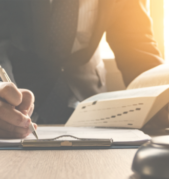 Man Signing a Document