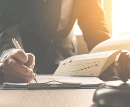 Man Signing a Document
