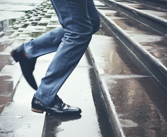 Man Walking Up Stairs