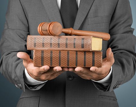 lawyer with books and gavel