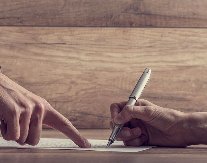 Hand signing contract