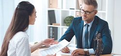 Attorney talking to a woman