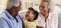 Grandparents playing with grandchild