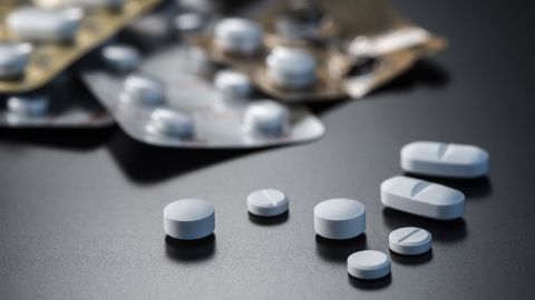 Assorted pills on surface