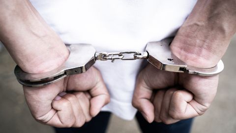 Hands in handcuffs