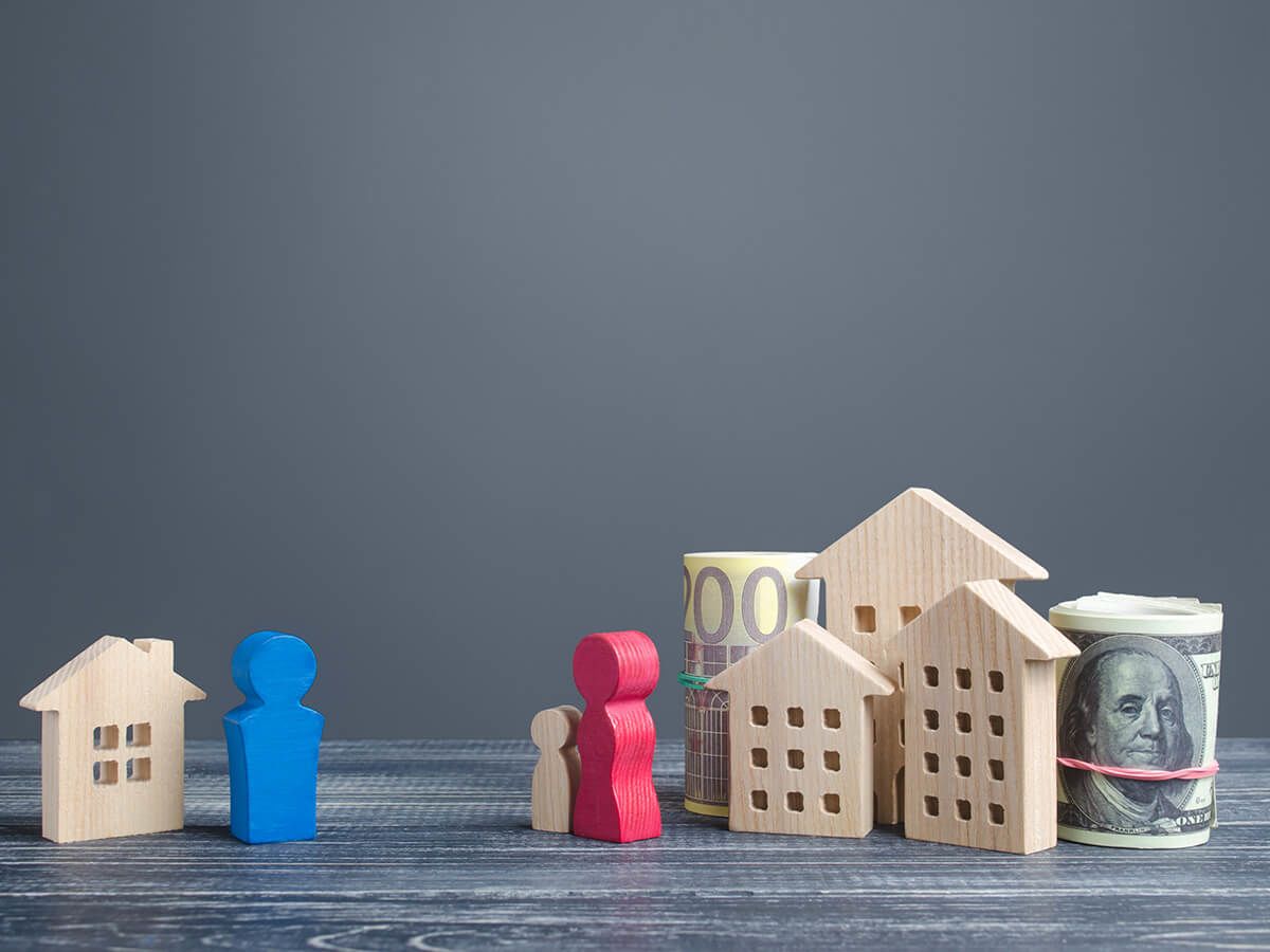Little wooden blocks depicting division of assets between former spouses