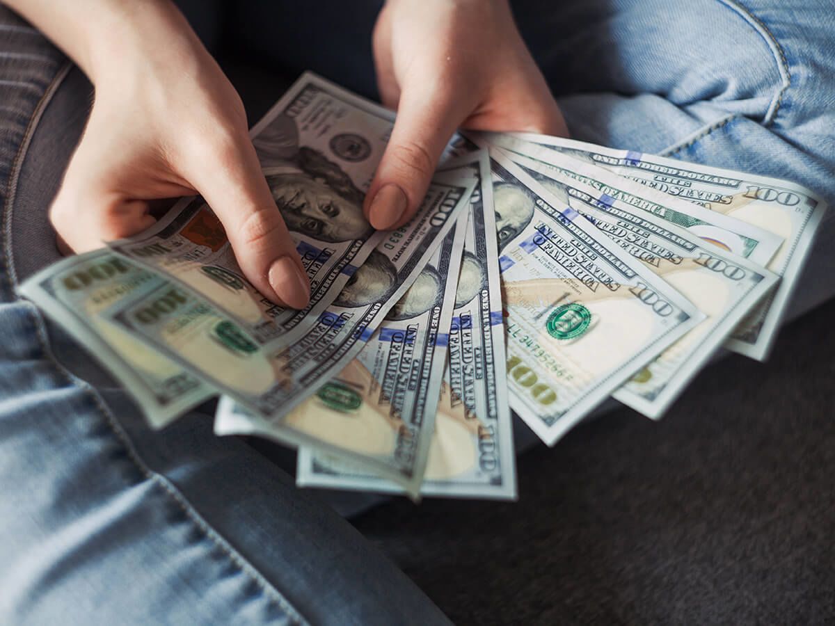 Person holding a bunch of cash