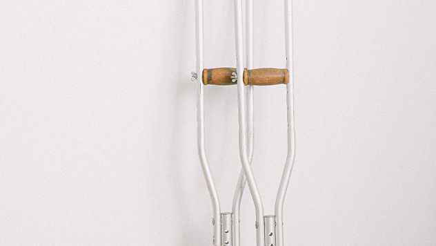 Crutches leaning against a wall