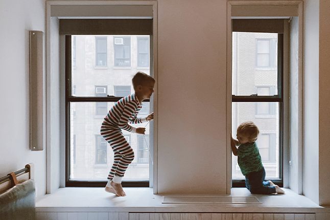 Kids playing in a bedroom